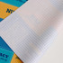 A multicoloured 3-in-1 microfibre cleaning mouse pad with a smooth surface and a patterned design.