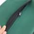A green laptop bag featuring a smooth zipper, showcasing a close-up of the zipper area.