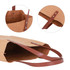 A brown washable kraft paper bag featuring a PU handle, showcasing details of its interior and handle design.