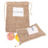 A jute net produce bag in natural brown, containing fruit, with a white label featuring text and a branding logo.