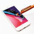 An orange stylus ball pen with a mobile holder is positioned over a smartphone screen, featuring a logo.