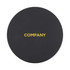 A black wireless charger with a round shape and a gold logo in the centre.