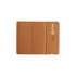 A foldable wireless charger in a light brown cork material, featuring a logo on one side.