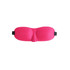 A bright pink cushioned eye mask featuring a contoured design and adjustable straps. It has a logo on one side.