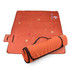 An orange picnic blanket, 200x200cm, features floral patterns and rolls up for easy transport with a handle.