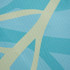 A square outdoor blanket in aqua and light cream with a textured geometric pattern, featuring a logo.