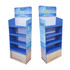 A premium cardboard floor display in blue with multiple shelves and a branding logo at the top.