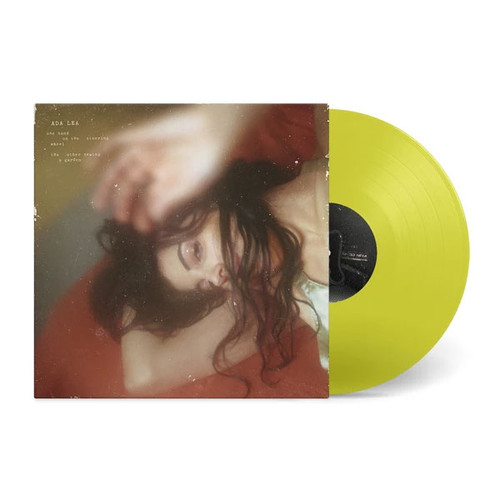 Ada Lea one hand on the steering wheel the other sewing a garden LP ("Electric Lemonade" Transparent Yellow Vinyl) 2