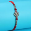 A D Premium Rakhi with Lindt, Cashew & 3 Pcs Ferrero Rocher - For UK