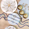 Evil Eye Rakhi Set Kaju Katli & Ferrero Hamper - For Canada