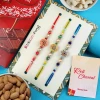 Vibrant Set of 3 Rakhi with Lindt & Dry Fruits - For USA