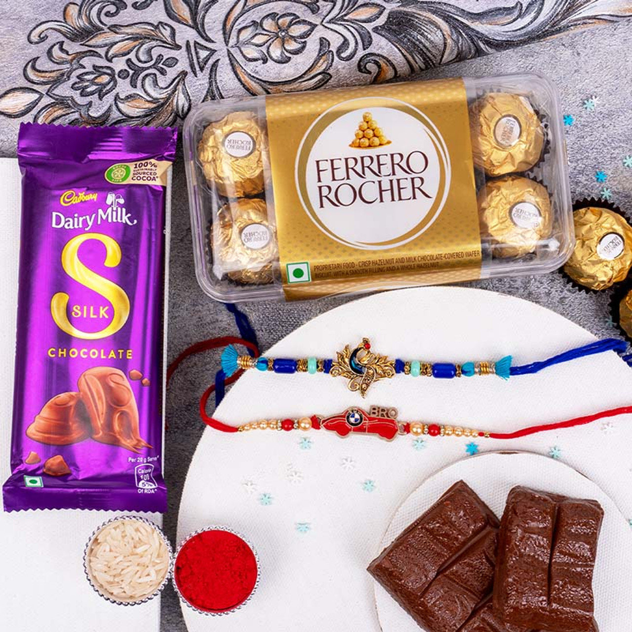 Rakhi Chocolate Combo Gift Hamper Rakhi Gift for Brother and Bhabhi  Rakshabandhan Rakhi with Cadbury Celebrations Chocolate Gift Pack Box,  Designer Rakhi, Roli chawal, Chocolates and Greeting Card : Amazon.in:  Grocery &