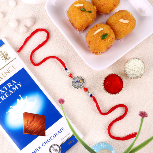 Religious Ganesha Rakhi with Haldiram Motichoor Ladoo & Lindt- For UK