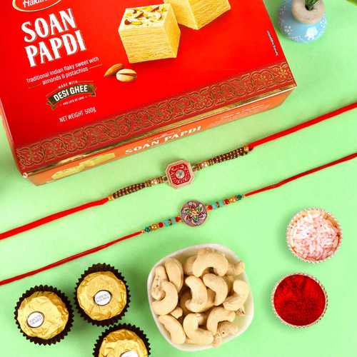 Astounding 2 Rakhi Set with Soan Papdi Chocolates & Nut  - For UK