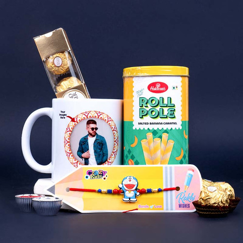 Doraemon Rakhi with Roll Pole and Personalized Photo Mug Gift Pack - For INDIA
