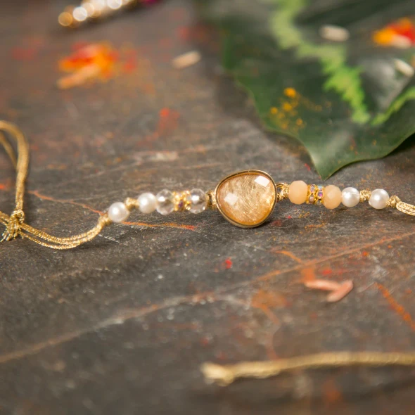 Premium Oval Shape Crystal Rakhi - For Canada