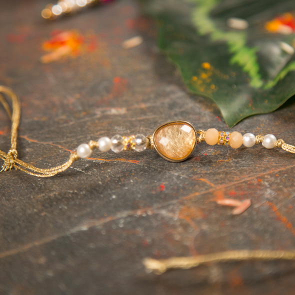 Oval Shape Crystal Rakhi - For Canada