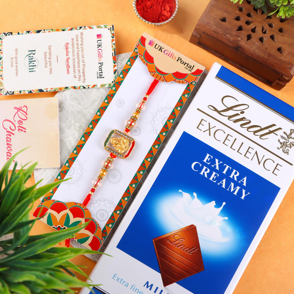 Designer Golden Ganesha Rakhi with Lindt Bar - For USA
