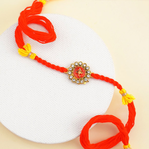 Sacred Golden Ganesha Rakhi with Sweets for Brother - For INDIA