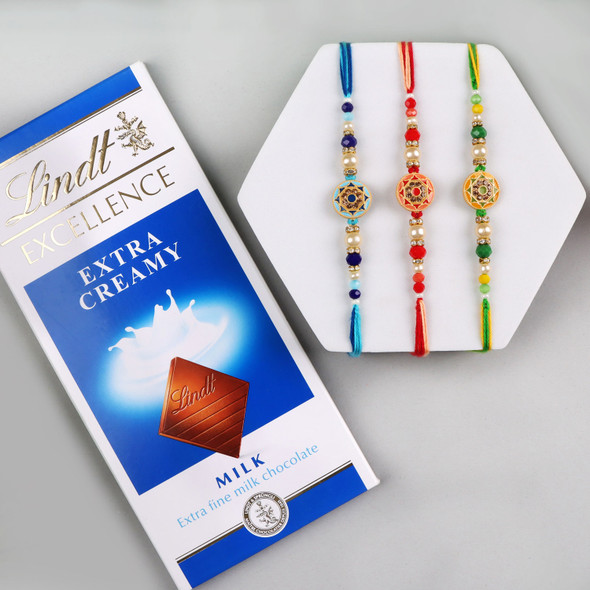 Alluring 3 Colourful Designer Rakhi Set with Lindt Chocolate - For UK