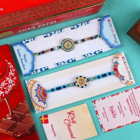 Floral Blue Rakhi Set with Soan Papdi & Lindt - For USA