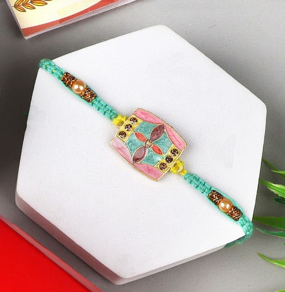 Fascinating Rakhi with Sweet & Cashews  - For Europe