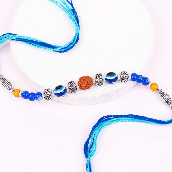 Blue Rakhi with Haldiram''s Gulab Jamun and Bro Mug- For INDIA