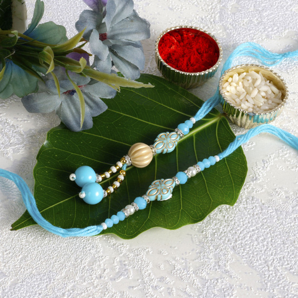 Elegant Sky Blue Bhaiya Bhabhi Rakhi Set - For USA