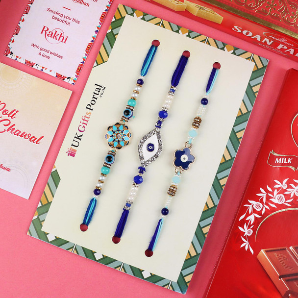 Dazzling Set of 3 Rakhis with Soan Papdi & Lindt - For USA