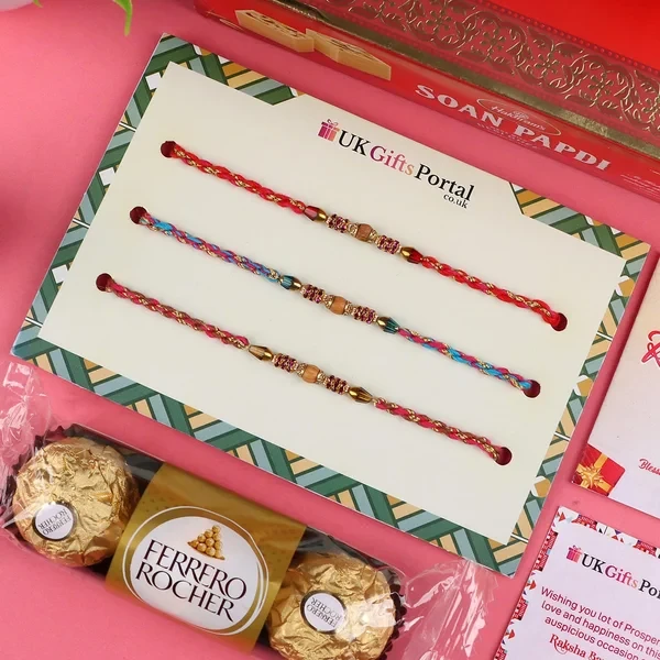 Appealing 3 Rakhi Set with Soan Papdi & 3 Pcs Ferrero - For USA