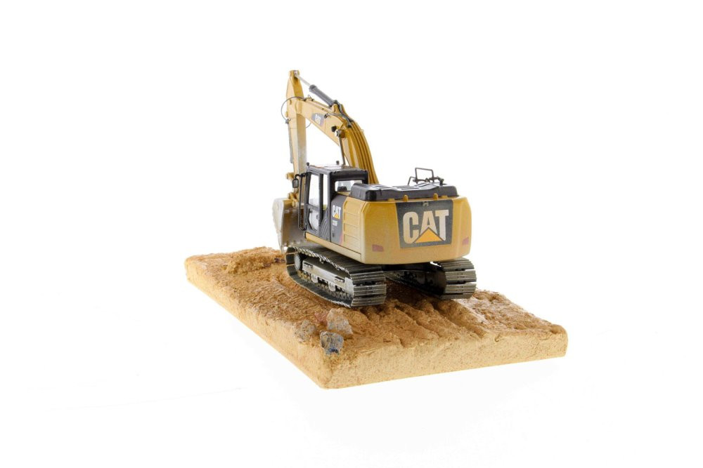 Caterpillar 320F Weathered Excavator with operator - Diecast Masters 85701 - 1/50 Scale Replica