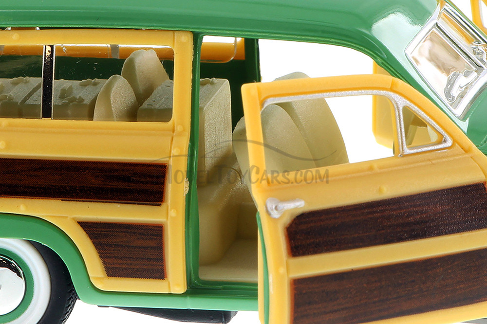 1949 Ford Woody Wagon with Surfboard Hardtop, Green - Kinsmart