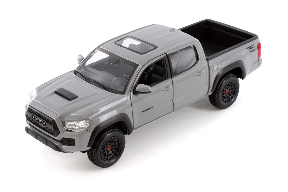 Box of 4 2023 Toyota Tacoma TRD Pro Pickup Truck Assortment - Showcasts 37910 - 1/27 Scale Diecast Cars