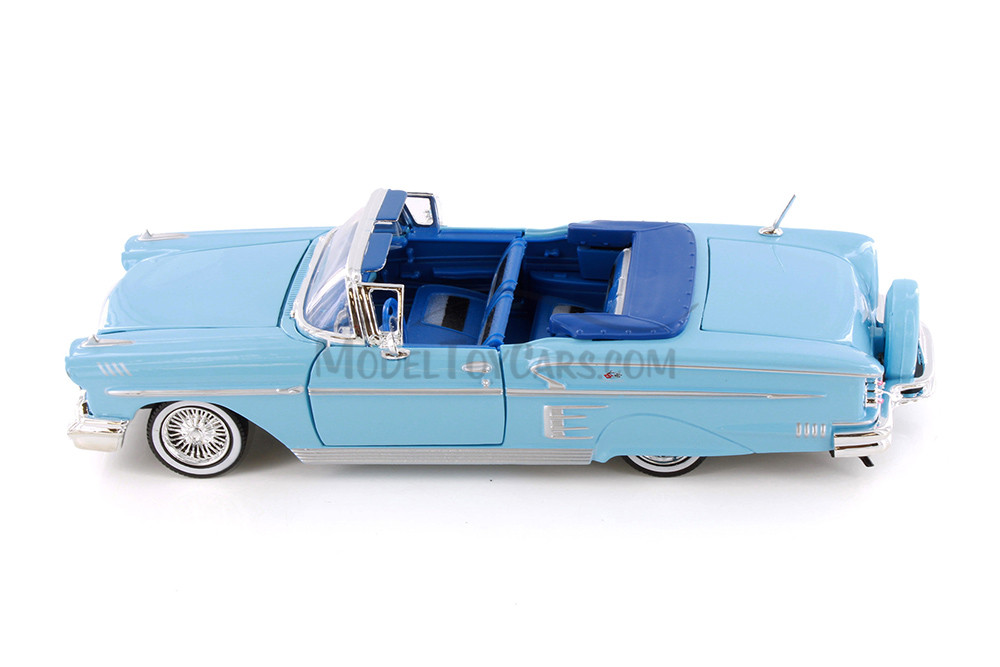 1958 Chevy® Impala™ Convertible, Light Blue - Showcasts® 77267D - 1/24 Scale Diecast Model Toy Car (1 Car, No Box)