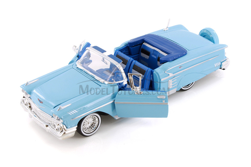 1958 Chevy® Impala™ Convertible, Light Blue - Showcasts® 77267D - 1/24 Scale Diecast Model Toy Car (1 Car, No Box)
