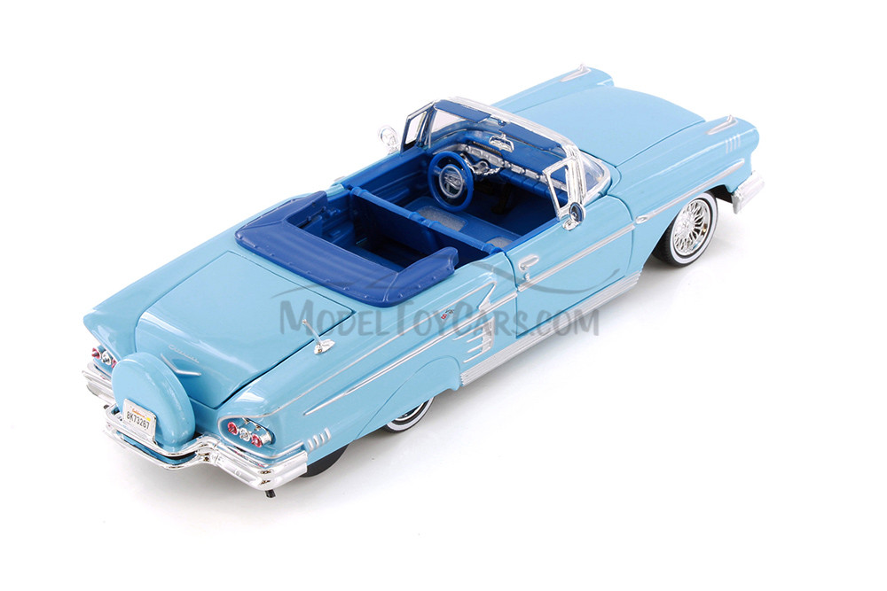 1958 Chevy® Impala™ Convertible, Light Blue - Showcasts® 77267D - 1/24 Scale Diecast Model Toy Car (1 Car, No Box)