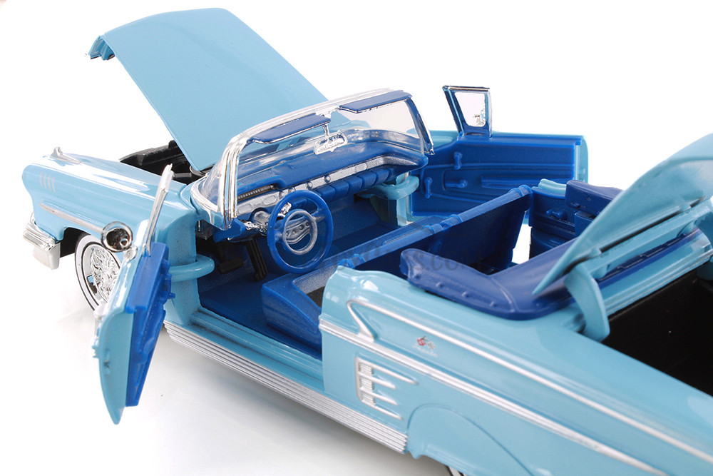 1958 Chevy Impala Convertible, Light Blue - Showcasts 77267D - 1/24 Scale Diecast Model Toy Car (1 Car, No Box)