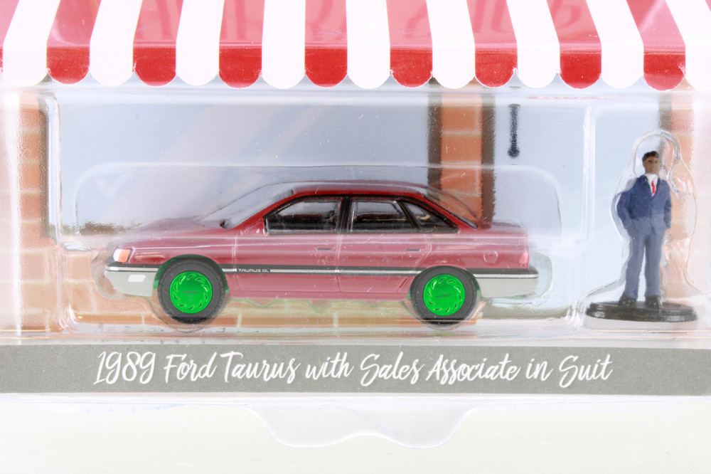 CHASE CAR Green Machine - 1989 Ford Taurus w/ Sales Associate in Suit, Red - Greenlight 97130D - 1/64 scale Diecast Car