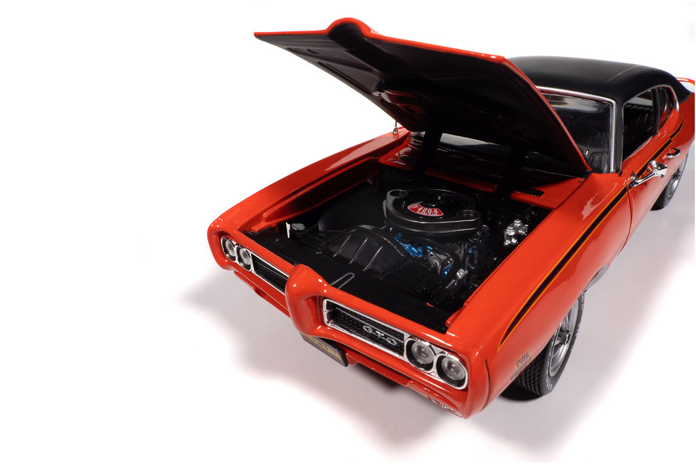 1969 Pontiac GTO Judge "Mecum Auctions", Carousel Red /Black Top - Auto World AMM1351 - 1/18 Scale Diecast Model Toy Car