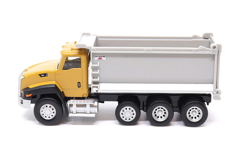 Caterpillar CT660 Dump Truck w/Ox Dump Body, Yellow/Light Gray - Diecast Masters 84643CS - 1/64 Scale Diecast Model Toy Car