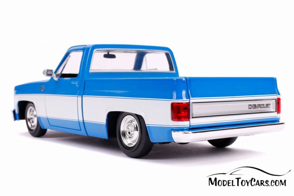 ミニカー JADA 1985 CHEVY C-10 (BLUE/WHITE) 1985 Chevy C10 Pickup Stock, Glossy Blue and White - Jada 31606