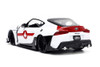 2020 Toyota Supra w/ Rick Hunter Figurine, White - Jada Toys 33685 - 1/24 scale Diecast Car