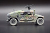 M1025 HMMWV Armament Carrier HUMVEE 4-CT Armored Fastback, Battle Worn Camo Green - Johnny Lightning - 1/64 scale Diecast Model Toy Car