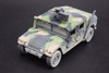M1025 HMMWV Armament Carrier HUMVEE 4-CT Armored Fastback, Battle Worn Camo Green - Johnny Lightning - 1/64 scale Diecast Model Toy Car