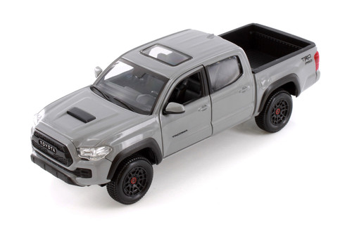 Box of 4 2023 Toyota Tacoma TRD Pro Pickup Truck Assortment - Showcasts 37910 - 1/27 Scale Diecast Cars