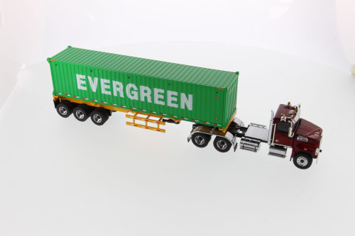 Western Star 4700 SB Tandem Cab Truck Tractor with Skeleton Trailer and 40' Evergreen Shipping Dry Goods Sea Container, Red and Green - Diecast Masters 71049 - 1/50 scale Replica