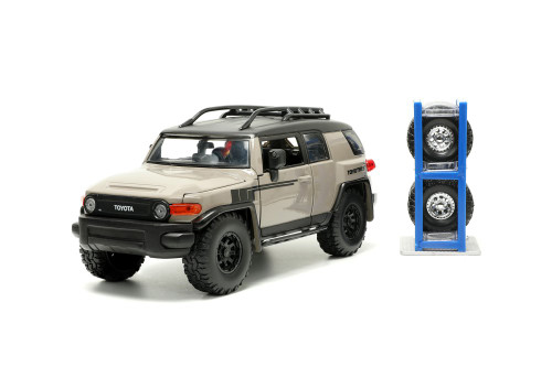 Toyota FJ Cruiser w/ Roof Rack and Extra Wheels, Beige