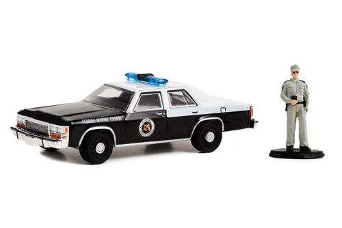1990 Ford LTD Crown Victoria w/ Police Officer, Black - Greenlight 97140D - 1/64 Scale Diecast Car