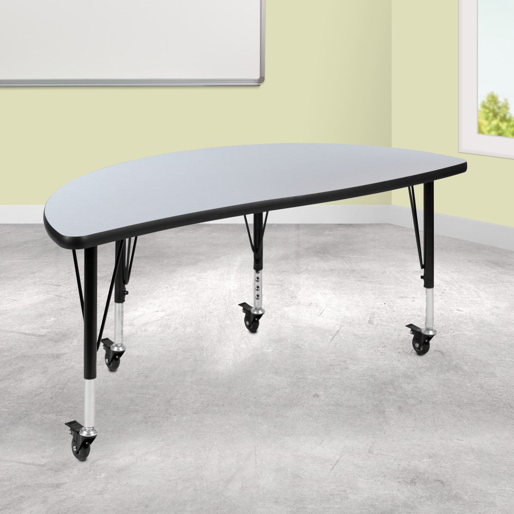 Revamp your classroom with the Flash Furniture Mobile 47-1/2in Half Circle Wave Flexible Collaborative Thermal Laminate Activity Table. Rolling casters allow you to move this table around your space with ease. The durable construction offers long-lasting use.  Thermal-fused laminate top is scratch- and stain-resistant.  Durable 16-gauge tubular steel legs adjust in 1in increments.  Powder-coated upper legs and chrome lower legs.  Rolling casters lock when needed.  This product is heavy and/or oversized and may need more than one person to handle.