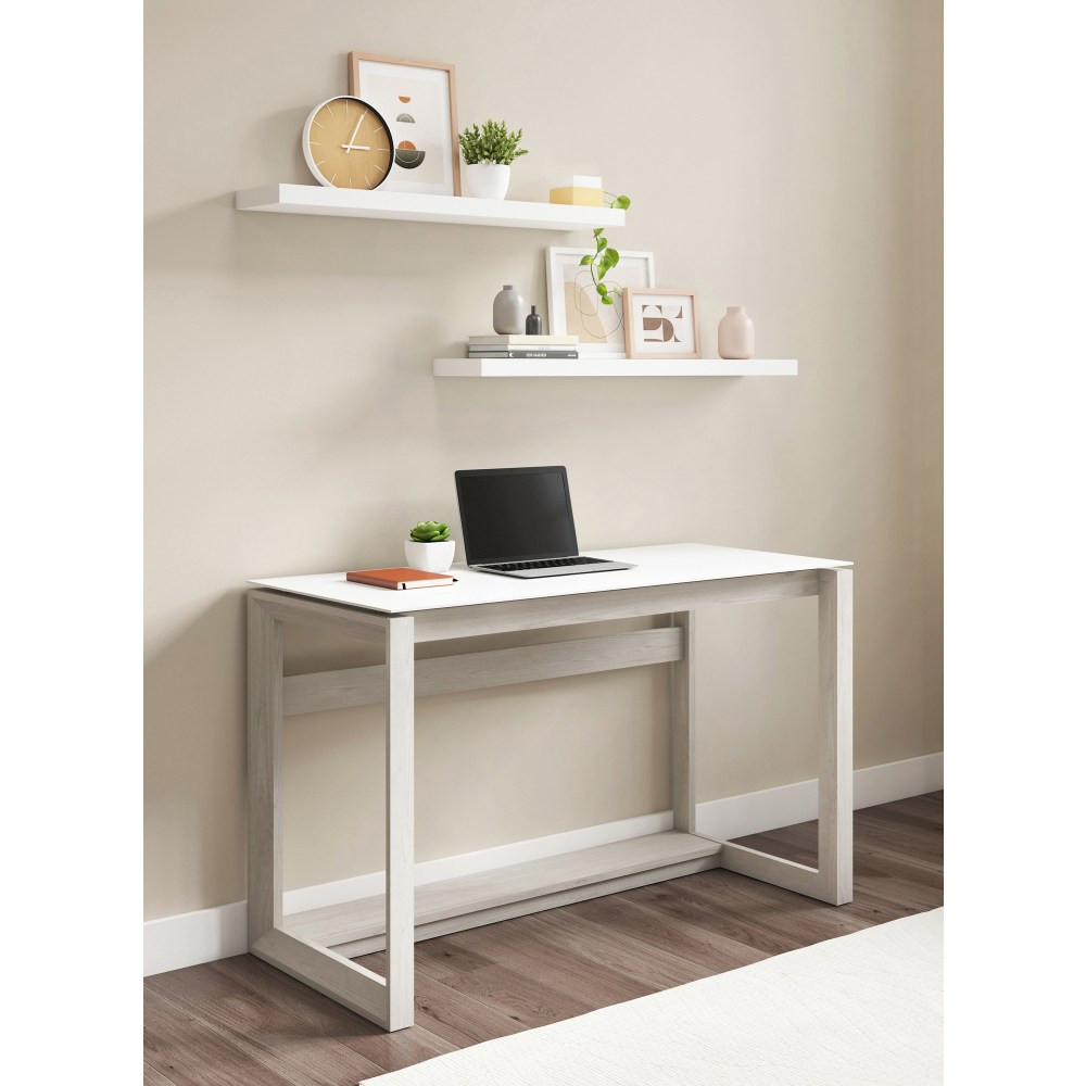 Transform your workspace with this Whalen Cecile 48in desk. The frosted tempered glass top adds a contemporary touch to your office decor, while the rectangular legs provide stability. Aluminum discs elevate the top for added style, and the furniture tack glides help prevent floor scratches and scuffs. This Whalen Cecile desk features a spacious work surface to accommodate a laptop and writing materials.  Engineered wood construction with laminate finish.  Rectangular legs and aluminum discs.  Tempered frosted glass worksurface.  Tack glides for floor protection.  Assembly required.  Backed by the manufacturers 1-year limited warranty.  Beautiful white oak.  Interested in in-home assembly? Please call our certified and insured professional assemblers 866-388-4350 today!
